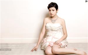 Taiwanese actress Michelle Chen elegantly posing for the camera